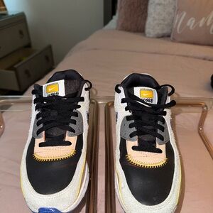 Nike Black and White Sneakers with Yellow and Blue Highlights